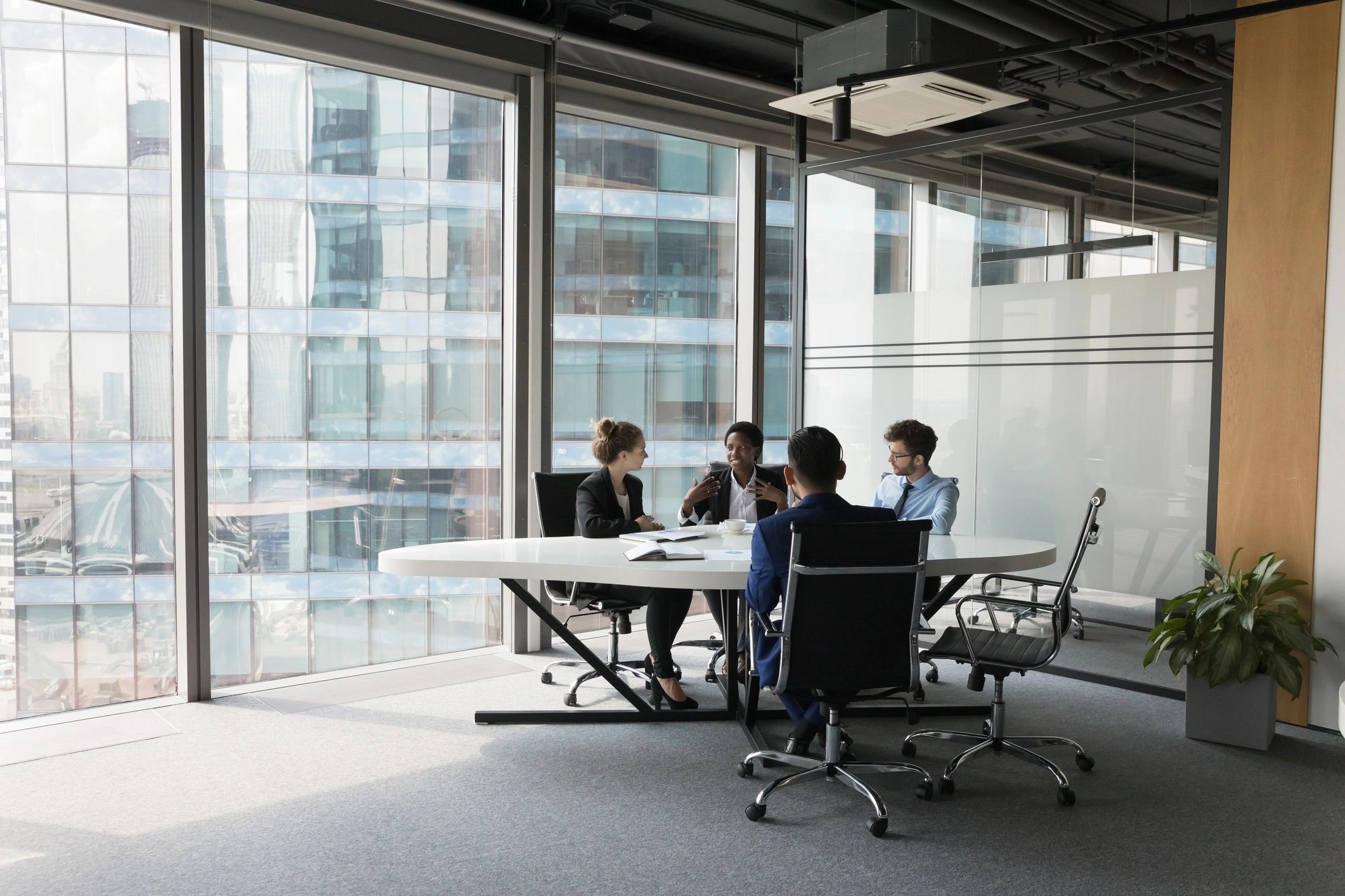 Consulting team collaborating in a meeting room
