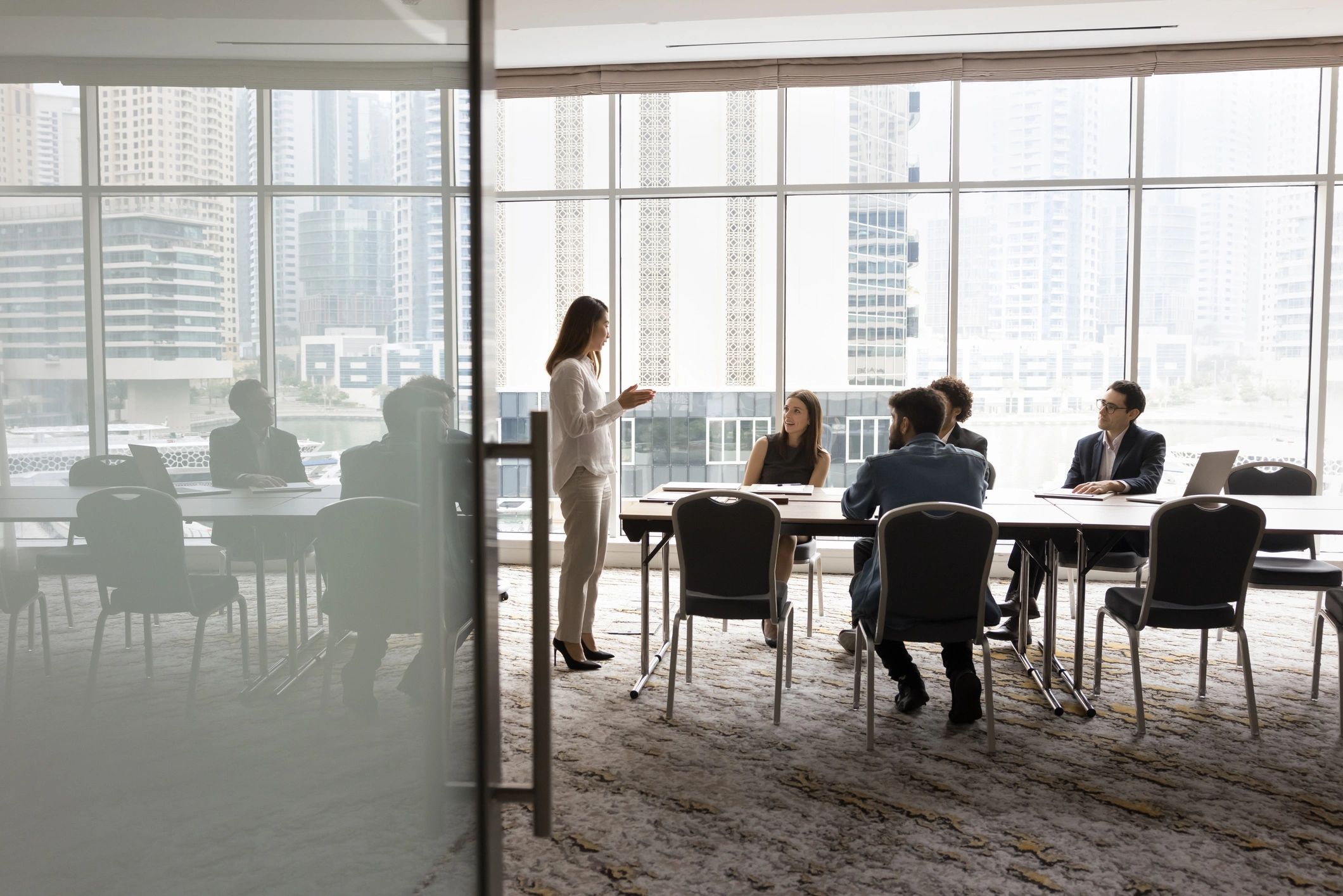 Multiethnic business team discussing strategy at a meeting table